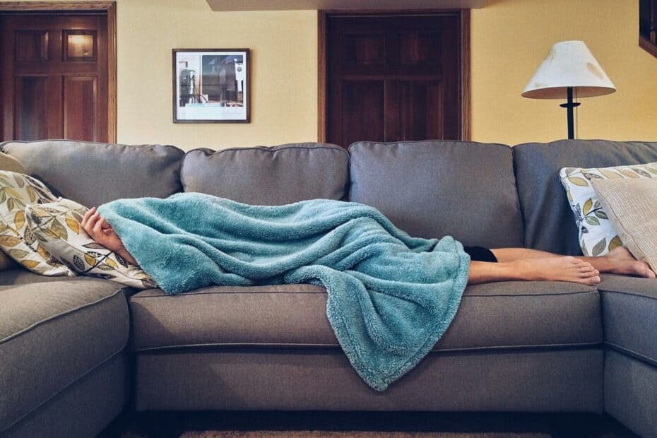 person lying on sofa