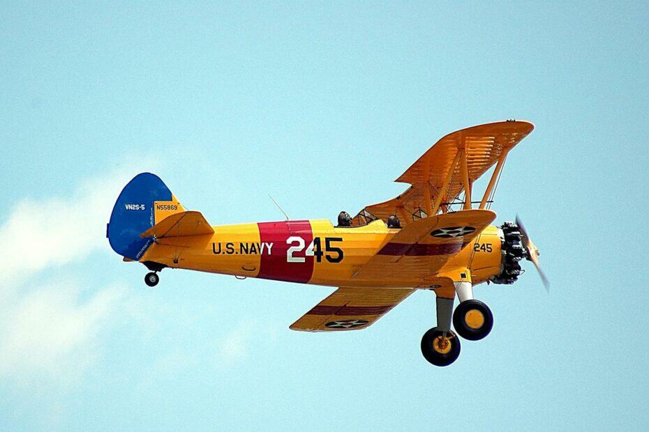 airplane flying against sky