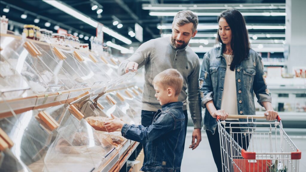 Family is shopping at a grocery store.