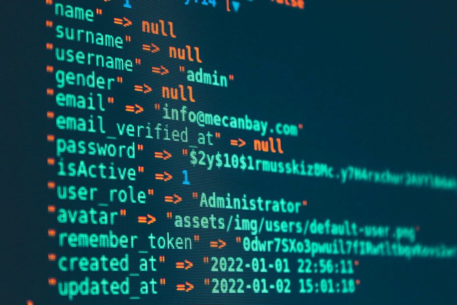 Vibrant close-up of code displayed on a monitor with various programming details.